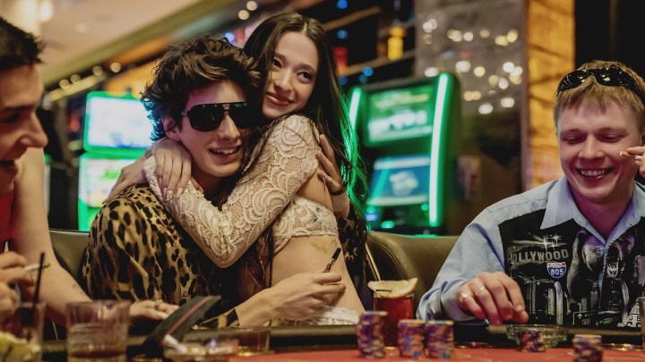 Woman embracing man in bar